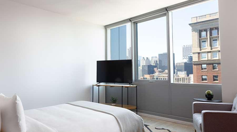 Sentral Michigan Avenue Aparthotel Chicago Phòng bức ảnh A bedroom at 100 East 14th Street